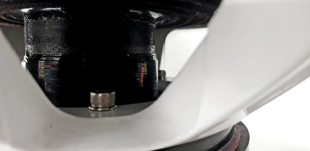Close-up of a heat-stressed subwoofer voice coil